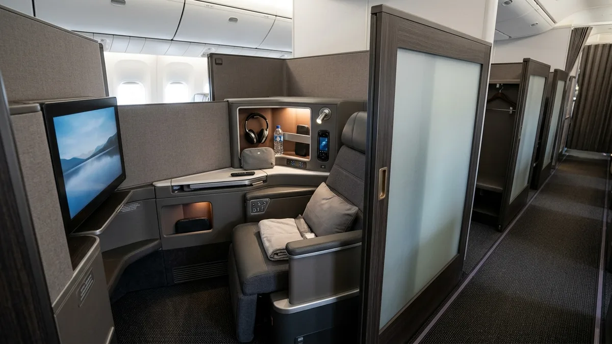 Enclosed business class suite with privacy door